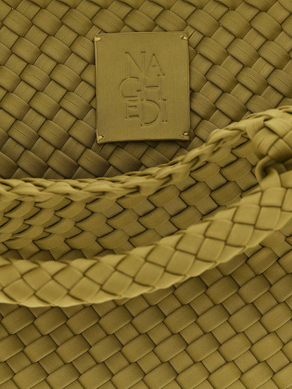Mini Drawstring Clutch Handbag by NAGHEDI for women in nylon neoprene & calfskin leather bicolour, gold, green & signature presents a ornamental silhouette, showcasing a secure snap, flap & zipper, ample , and versatile shoulder-strap, handle & adjustable-strap for a ornamental finish.