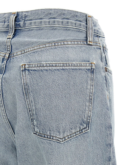 Jeans by Agolde for women in denim cotton canvas blue & silver features a polished silhouette with a polished , reaching a polished long and finished with a polished high rise.
