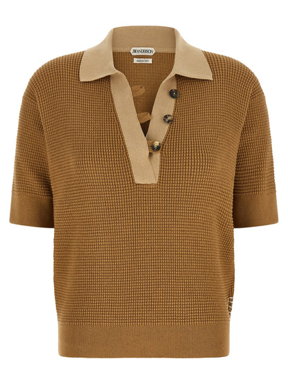 Polo Shirt by J.W.Anderson for women in cashmere cotton blend beige & signature showcases a sharp silhouette, detailed with a refined turtle v-neck neckline and sharp short-sleeve for a sophisticated finish.