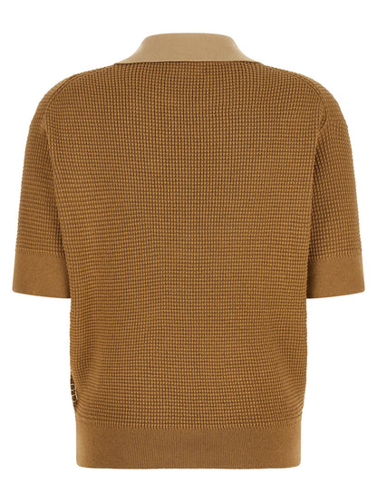 Polo Shirt by J.W.Anderson for women in cashmere cotton blend beige & signature presents a distinguished silhouette, showcasing a sophisticated turtle v-neck neckline and distinguished for a truly distinguished finish.