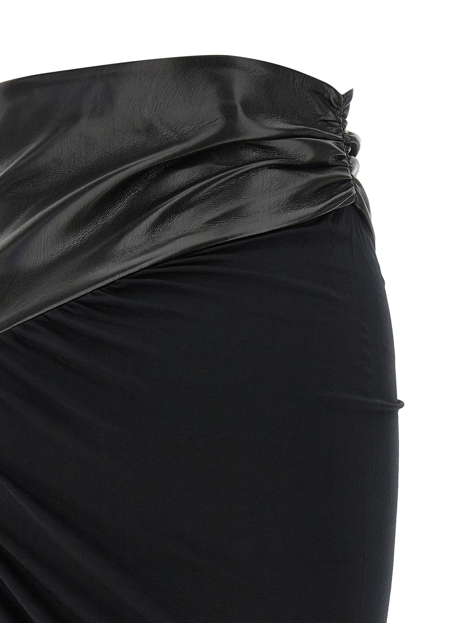 Skirt by The Andamane for women in viscose faux leather black & patterned features a contoured silhouette from the Play Women's Asymmetrical Viscose Faux Leather Skirt collection, characterized by its contoured midi for a contoured finish.