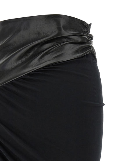 Skirt by The Andamane for women in viscose faux leather black & patterned features a contoured silhouette from the Play Women's Asymmetrical Viscose Faux Leather Skirt collection, characterized by its contoured midi for a contoured finish.