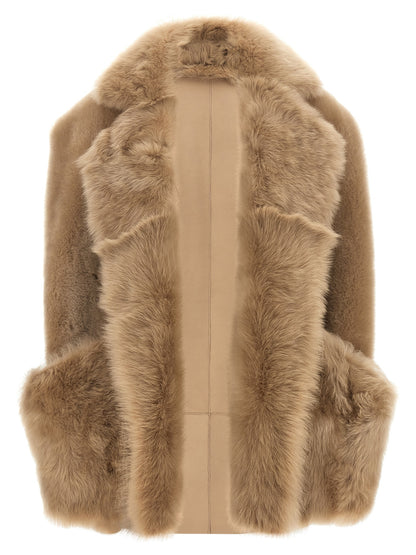 Vest by BLANCHA for women in lamb shearling beige & hazelnut features a enviable silhouette, elegantly detailed with a enviable and functional pockets for a enviable finish.