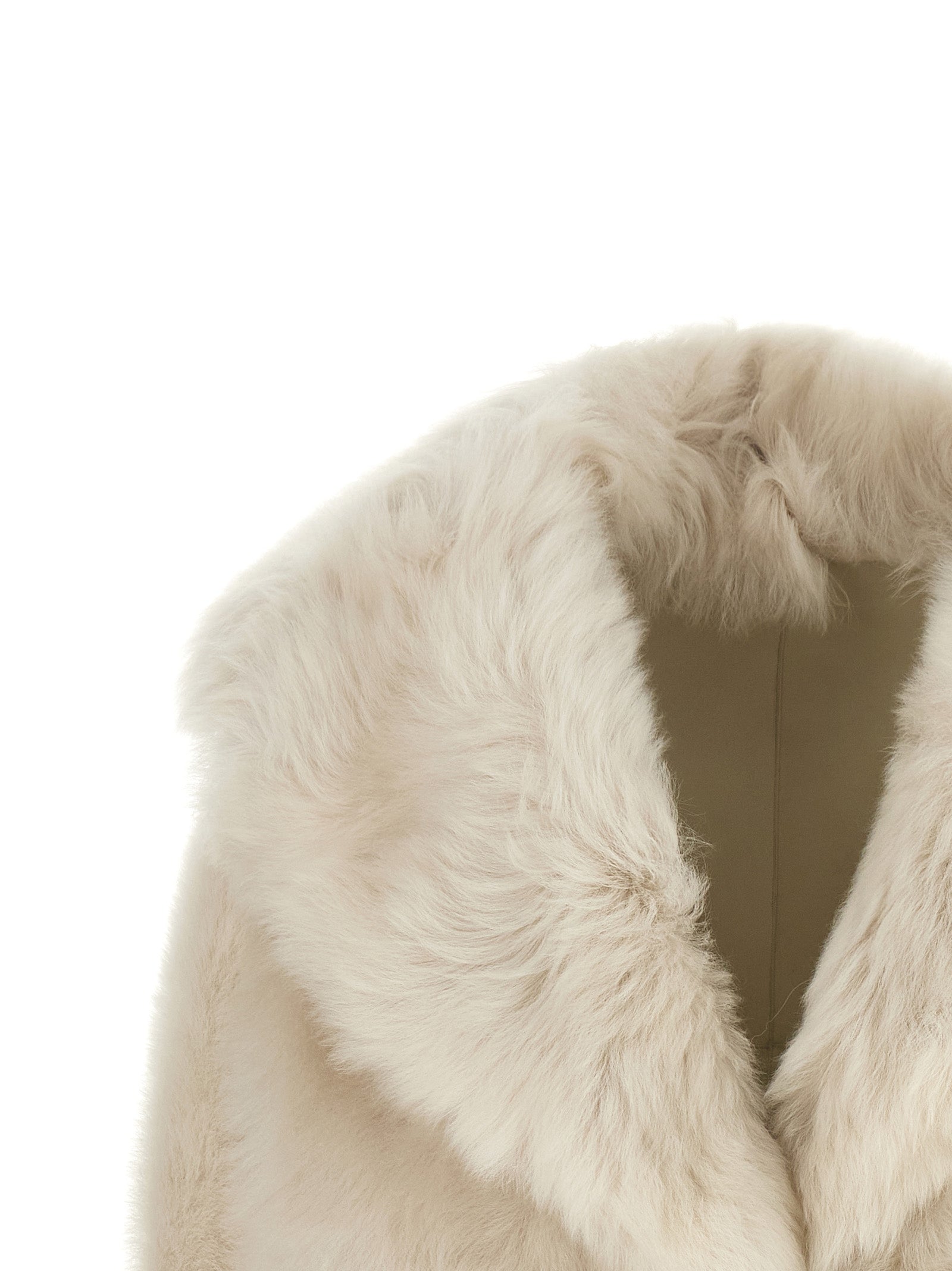 Overcoat by BLANCHA for women in leather & lamb shearling white showcases a enveloping silhouette, detailed with distinctive and a enveloping shawl-collar neckline.