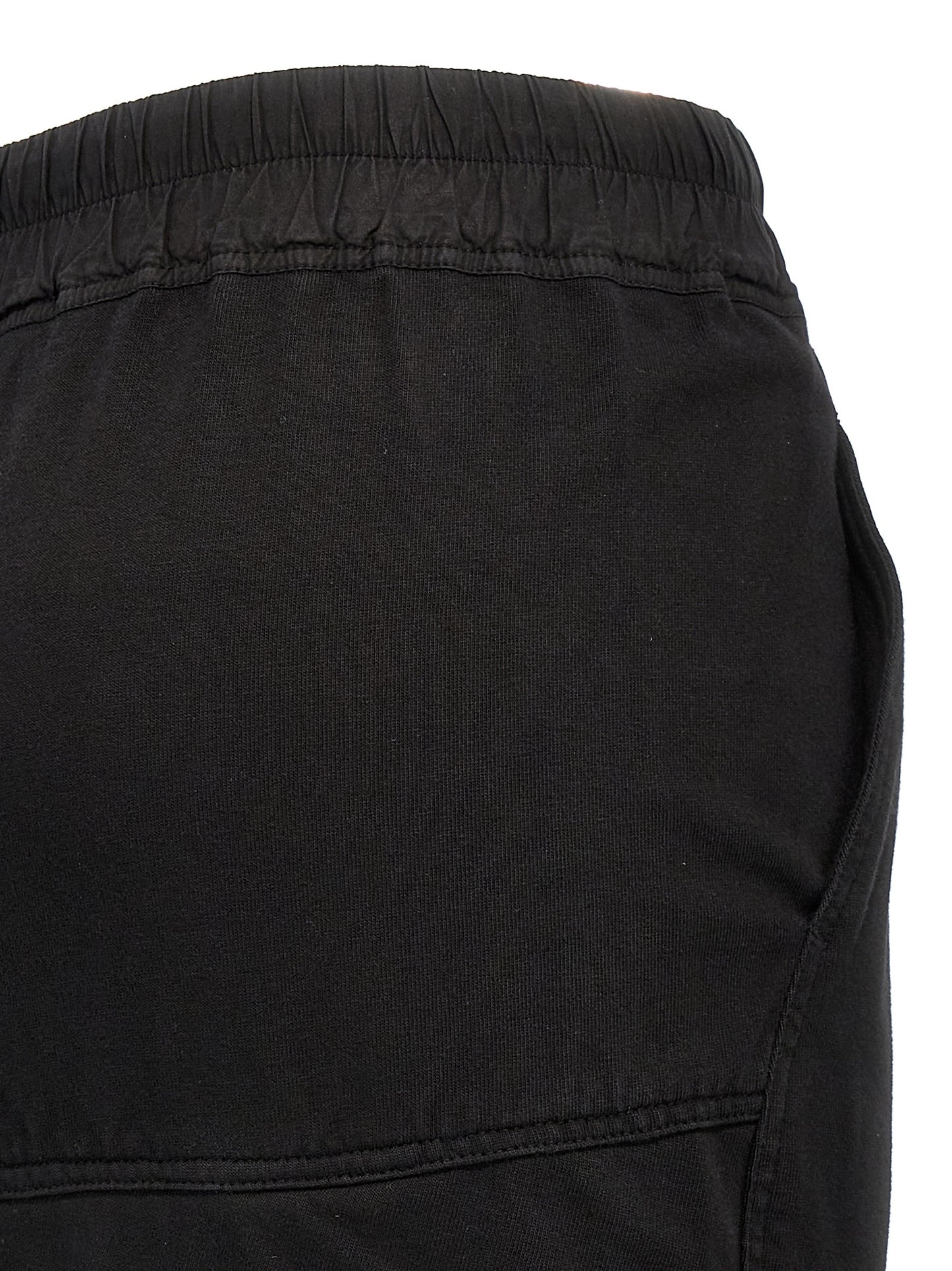 Skirt by DRKSHDW for women in organic cotton black showcases a sultry silhouette, elegantly defined by its maxi mini and the sophisticated sultry design of the Women's Organic Cotton Skirt.