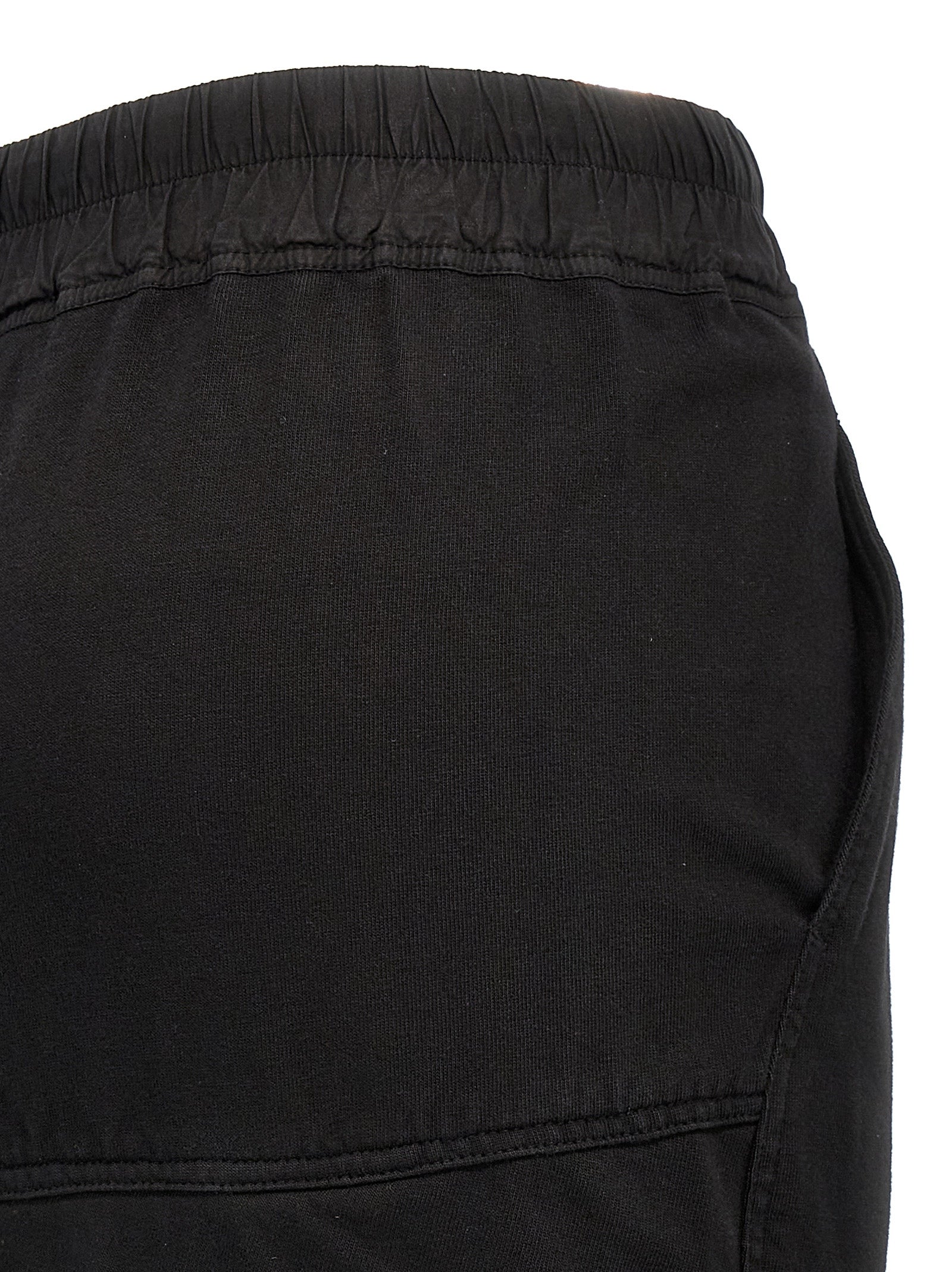Skirt by DRKSHDW for women in organic cotton black showcases a sultry silhouette, elegantly defined by its maxi mini and the sophisticated sultry design of the Women's Organic Cotton Skirt.