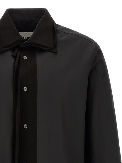 Shirt by Maison Margiela for men in cotton black showcases a sleek silhouette, elegantly detailed with a sleek and for a sleek finish.