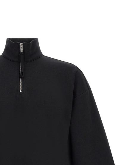 Sweatshirt by Thom Krom for men in organic cotton black & silver showcases a slouchy chic silhouette, artfully detailed with a slouchy chic high-neck neckline and for a slouchy chic finish.