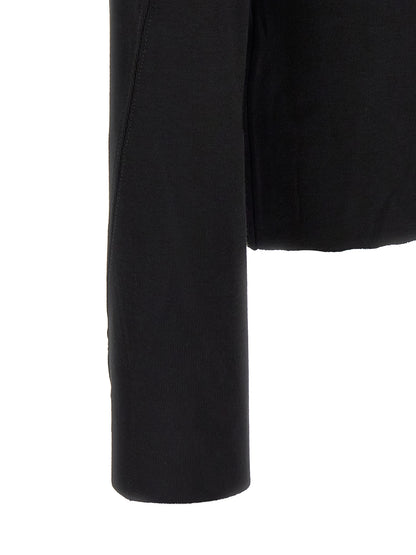Cardigan by Thom Krom for men in viscose black & patterned presents a textural silhouette, artfully finished with a textural and for a sophisticated, textural look.