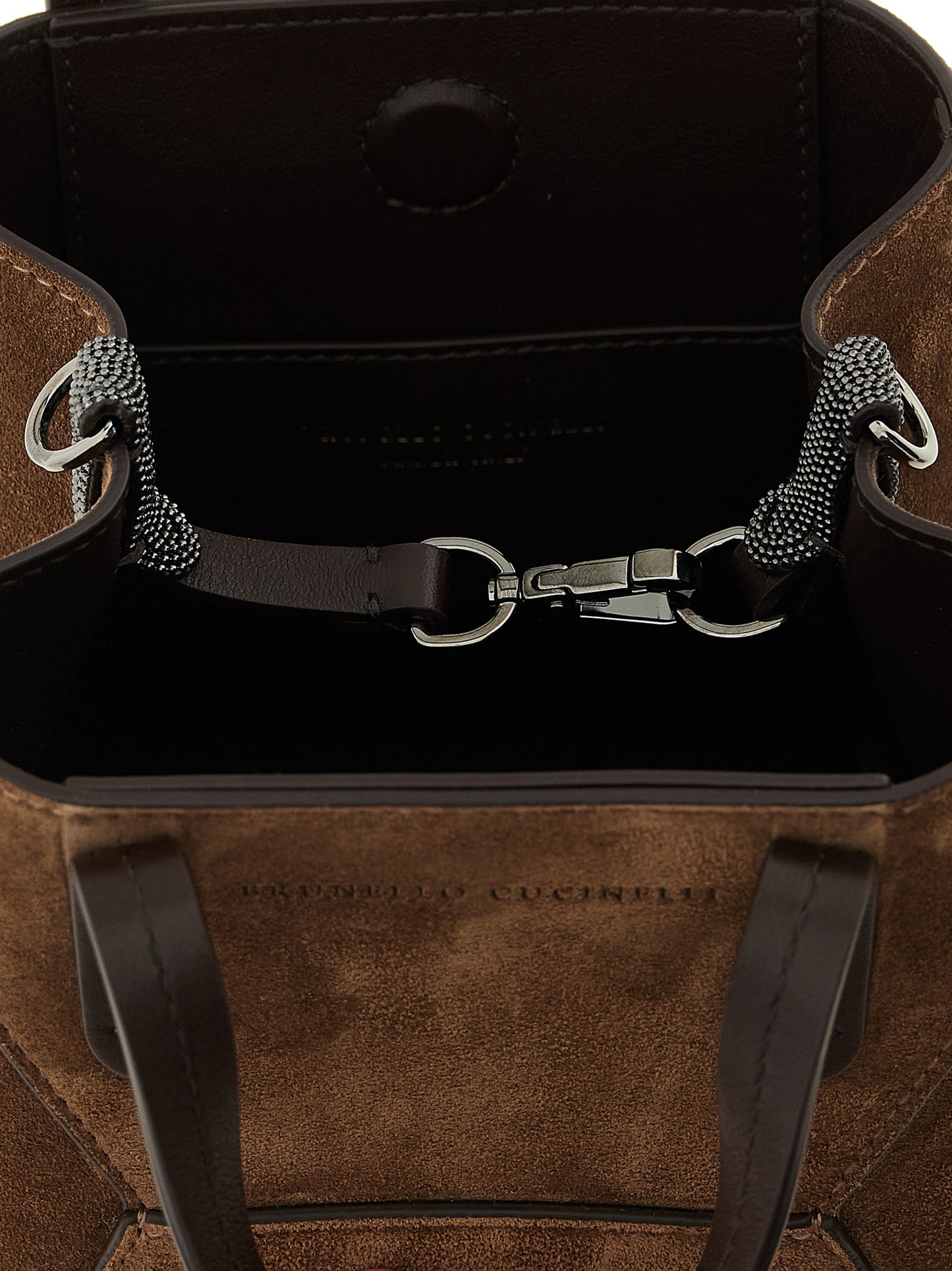 Mini Flap Handbag by Brunello Cucinelli for women in suede calfskin leather bicolour, brown, green & signature presents a ornamental silhouette, showcasing a secure snap, flap, magnetic & hook, ample , and versatile shoulder-strap, handle, adjustable-strap & detachable-strap for a ornamental finish.