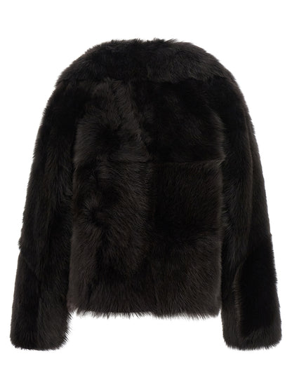 Overcoat by BLANCHA for women in lamb shearling brown features an voluminous silhouette, showcasing distinct and a voluminous shawl-collar neckline for a truly voluminous aesthetic.