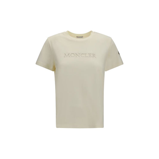 T-Shirt by Moncler for women in cotton beige showcases a unassuming silhouette, artfully detailed with a refined crew neckline and unassuming short-sleeve for a sophisticated, contemporary look.