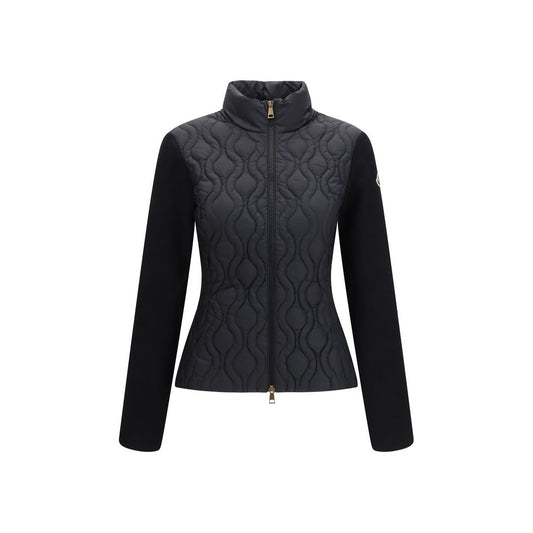 Windbreaker Jacket by Moncler for women in cotton black presents a resilient silhouette, artfully detailed with a sophisticated and functional pockets, insulated & windproof for a resilient finish.
