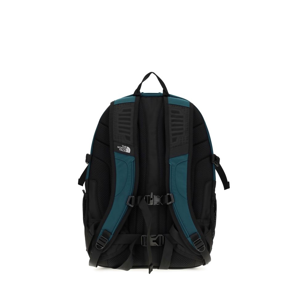 Medium Flap Backpack Shoulder Bag by The North Face for men in nylon & calf leather bicolour & green features a effortless chic silhouette with a secure snap & flap, ample , and versatile shoulder-strap, backpack-strap, adjustable-strap, belt-strap & handle for a effortless chic finish.