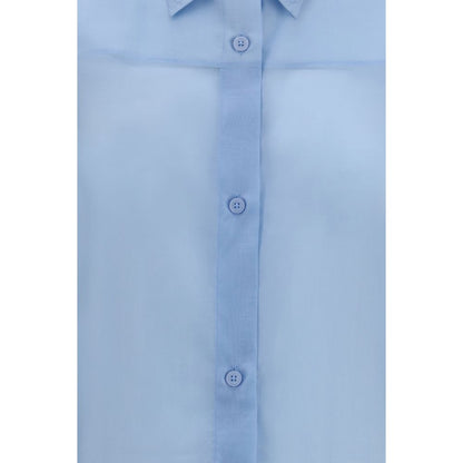 Dress Shirt by The Latest for women in merino wool & polyester blue showcases a sublime silhouette, artfully detailed with a sublime and for a sophisticated, sublime finish.