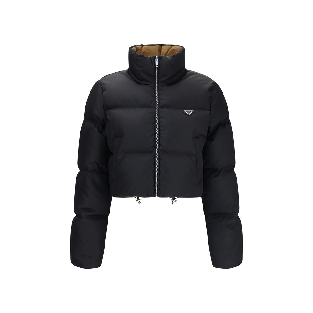 Puffer Jacket by Prada for women in nylon & goose-down black & signature features an on trend silhouette, showcasing refined pockets & insulated and a sophisticated for a truly on trend finish.
