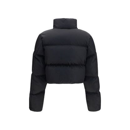 Puffer Jacket by Prada for women in nylon & goose-down black & signature features a dramatic silhouette, showcasing a sophisticated and distinctive pockets & insulated for a dramatic aesthetic.