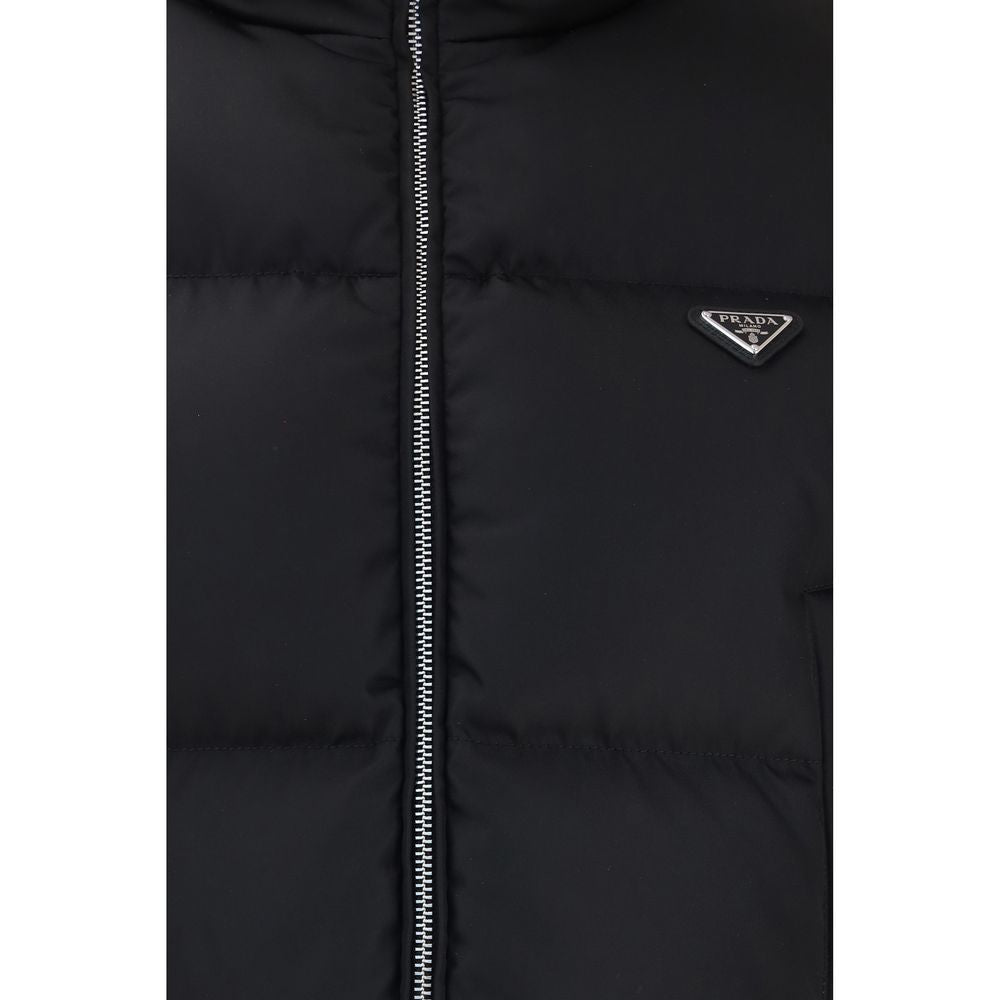 Puffer Jacket by Prada for women in nylon & goose-down black & signature features an contemporary silhouette, showcasing a sophisticated and contemporary pockets & insulated for a truly refined look.