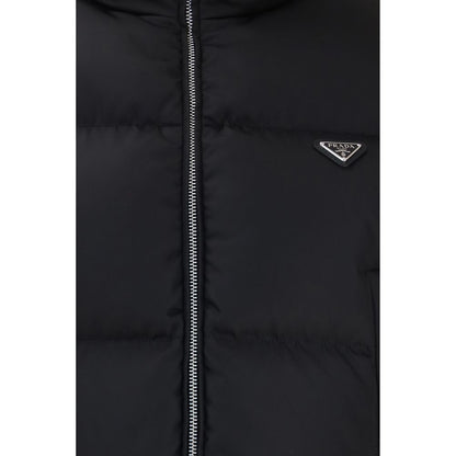 Puffer Jacket by Prada for women in nylon & goose-down black & signature features an contemporary silhouette, showcasing a sophisticated and contemporary pockets & insulated for a truly refined look.