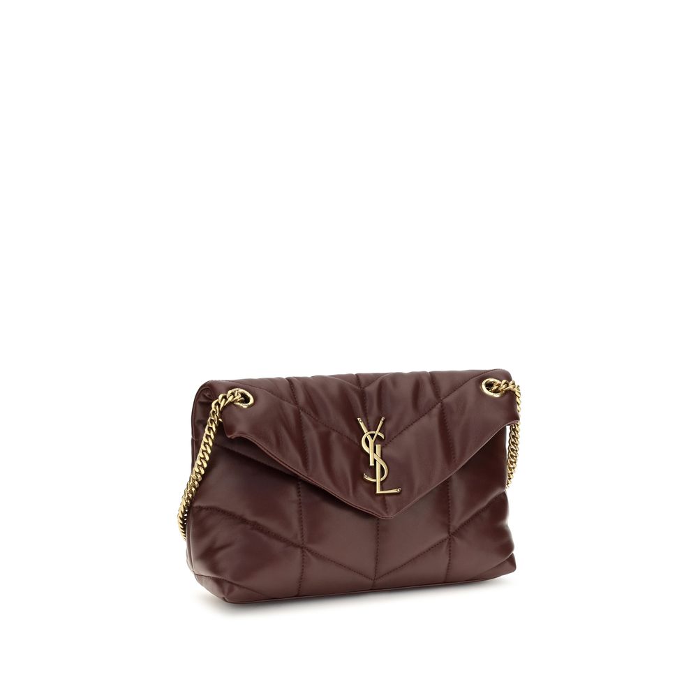 Mini Crossbody Flap Shoulder Bag by Saint Laurent for women in calf & lambskin leather bicolour, gold, green & signature features a enviable silhouette, showcasing a secure snap, flap, magnetic & button, ample single-compartment, and enviable crossbody-strap, shoulder-strap, handle & adjustable-strap for a enviable finish.