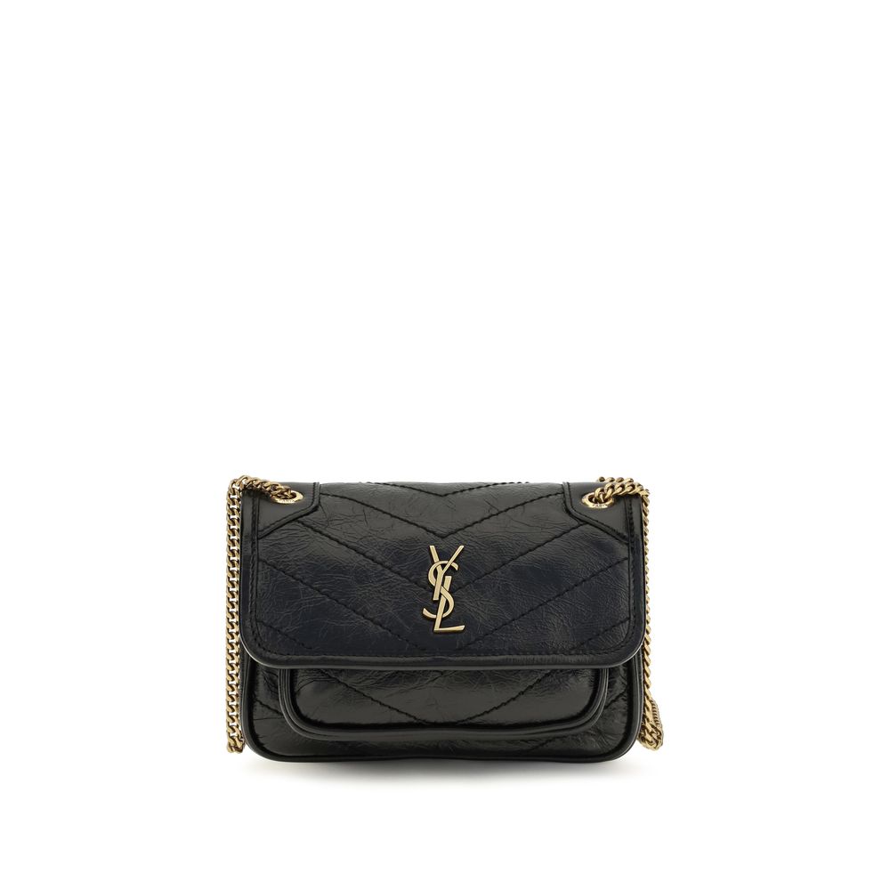 Mini 2-in-1 Shoulder & Crossbody Bag by Saint Laurent for women in bos taurus calf leather black & bronze presents a versatile silhouette, showcasing a secure magnetic and versatile built-in-compartments with versatile crossbody-strap & shoulder-strap for a sophisticated look.
