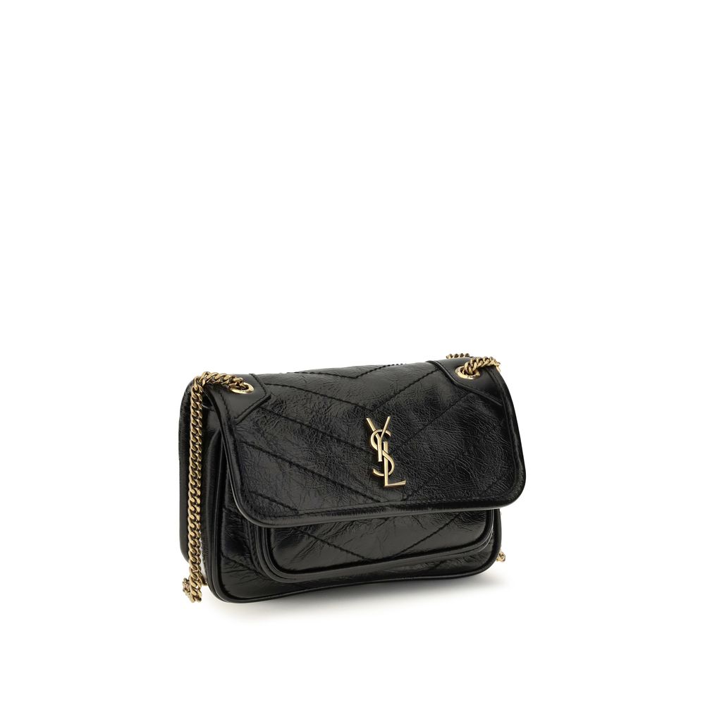 Mini 2-in-1 Shoulder & Crossbody Bag by Saint Laurent for women in bos taurus calf leather black & bronze features a distinguished silhouette, showcasing a secure magnetic and distinguished built-in-compartments with versatile crossbody-strap & shoulder-strap for a distinguished finish.