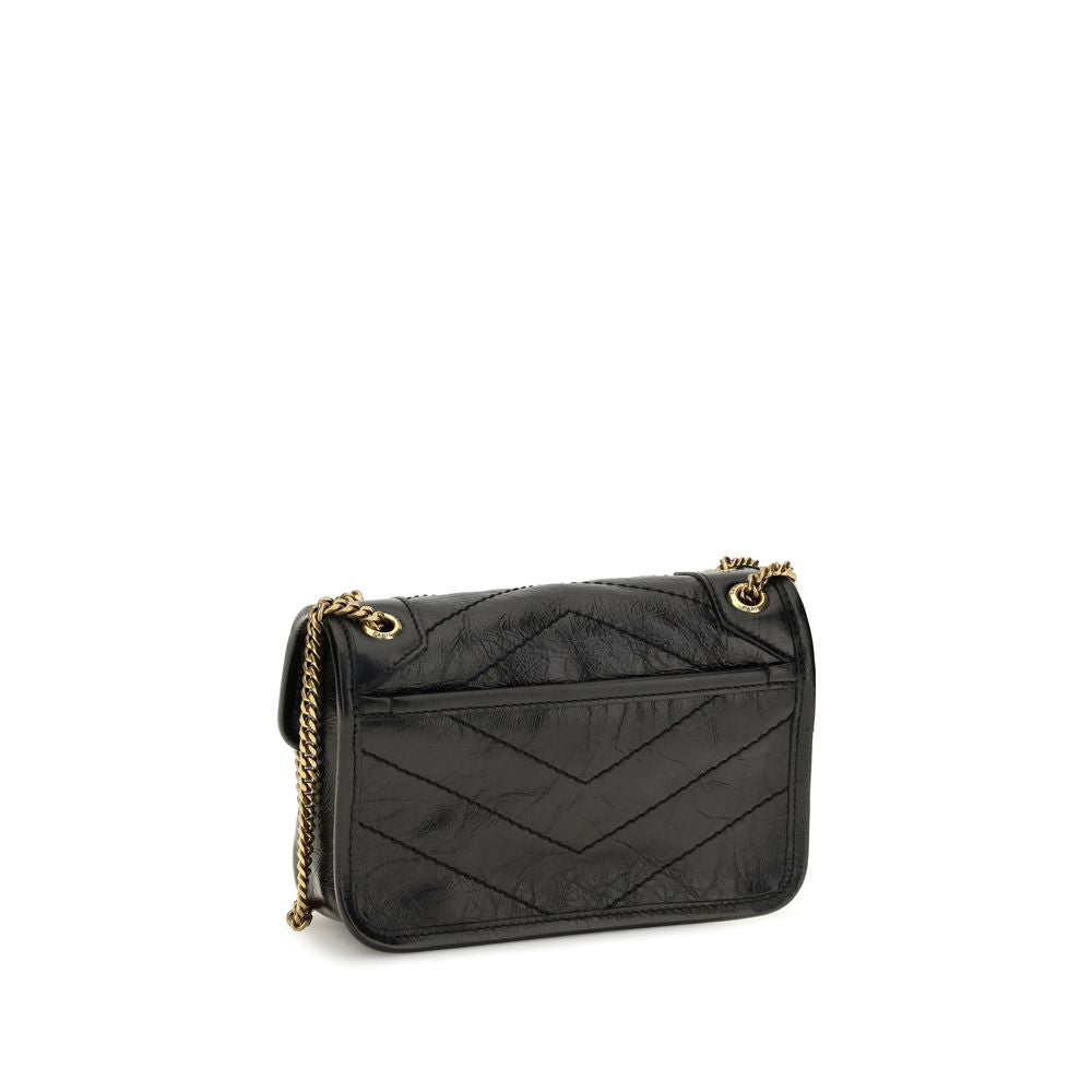 Mini 2-in-1 Shoulder & Crossbody Bag by Saint Laurent for women in bos taurus calf leather black & bronze showcases a enviable silhouette, artfully detailed with a secure magnetic, organized built-in-compartments, and versatile crossbody-strap & shoulder-strap for a enviable look.