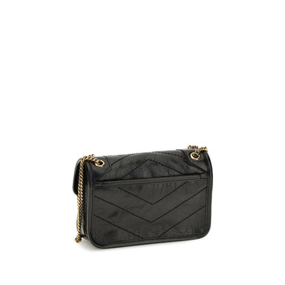 Mini 2-in-1 Shoulder & Crossbody Bag by Saint Laurent for women in bos taurus calf leather black & bronze showcases a enviable silhouette, artfully detailed with a secure magnetic, organized built-in-compartments, and versatile crossbody-strap & shoulder-strap for a enviable look.