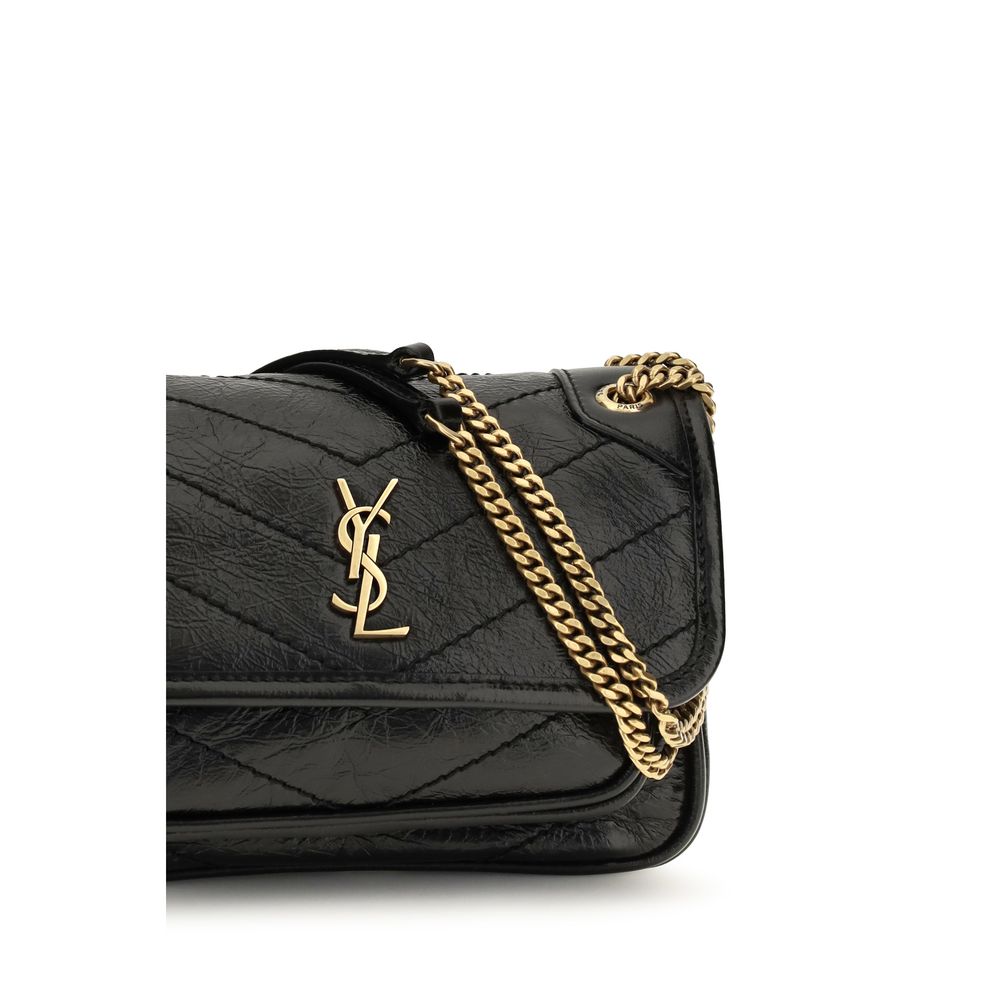 Mini 2-in-1 Shoulder & Crossbody Bag by Saint Laurent for women in bos taurus calf leather black & bronze showcases a enviable silhouette, artfully detailed with a secure magnetic, organized built-in-compartments, and versatile crossbody-strap & shoulder-strap for a enviable look.