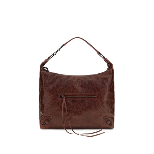 Crossbody Flap Shoulder Bag by Balenciaga for women in calf & lambskin leather bicolour & green features a enviable silhouette, showcasing a secure snap, flap & zipper, ample , and enviable crossbody-strap, shoulder-strap, handle & adjustable-strap for a enviable finish.