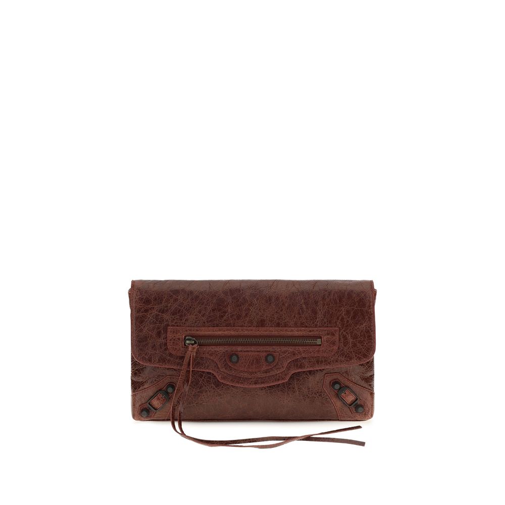 Mini Drawstring Clutch Handbag by Balenciaga for women in calf & lambskin leather bicolour, green & signature features a sculptural silhouette with a secure snap, flap, zipper & magnetic, ample , and versatile shoulder-strap, handle & adjustable-strap for a sculptural finish.