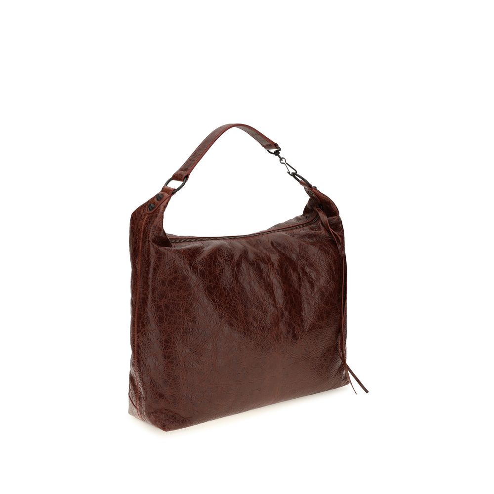 Crossbody Flap Shoulder Bag by Balenciaga for women in calf & lambskin leather bicolour & green features a effortless chic silhouette with a secure snap, flap & zipper, ample , and versatile crossbody-strap, shoulder-strap, handle & adjustable-strap for a effortless chic finish.
