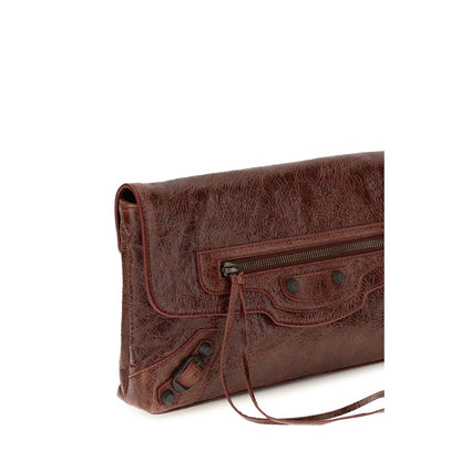 Mini Drawstring Clutch Handbag by Balenciaga for women in calf & lambskin leather bicolour, green & signature features a statuesque silhouette, showcasing a secure snap, flap, zipper & magnetic and organized with versatile shoulder-strap, handle & adjustable-strap for statuesque evening wear.