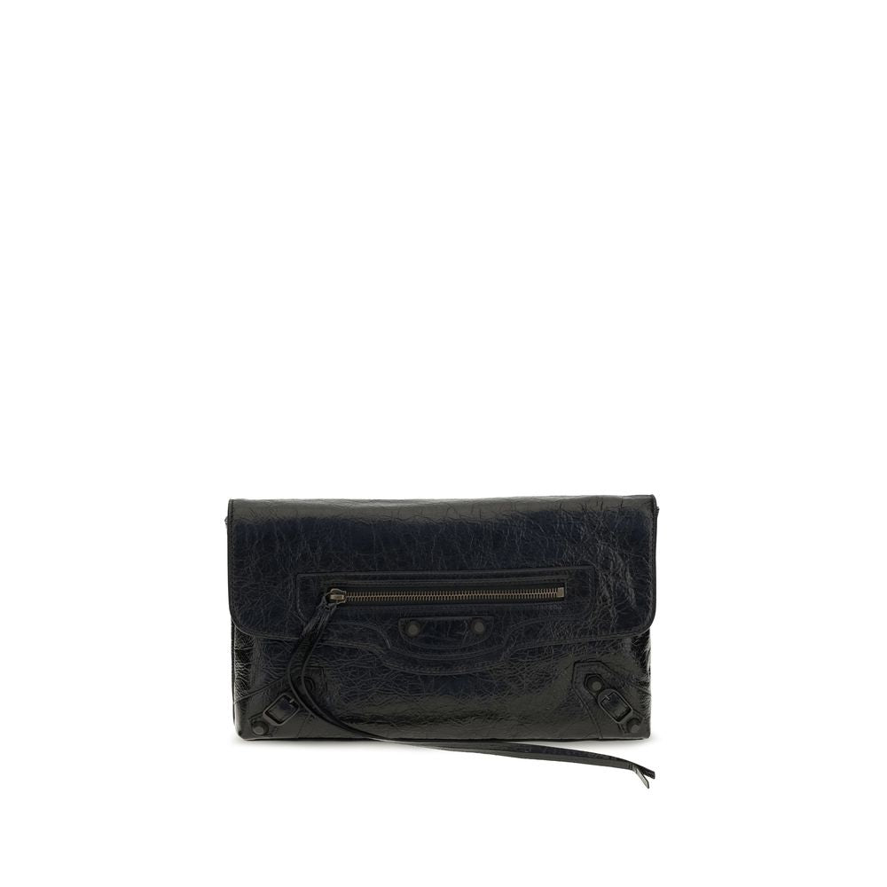 Mini Drawstring Clutch Handbag by Balenciaga for women in calf & lambskin leather bicolour, black & green features an sculptural silhouette, showcasing a secure snap, flap, zipper & magnetic and sculptural with versatile shoulder-strap, adjustable-strap & handle for a sophisticated look.