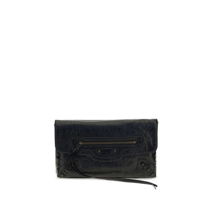 Mini Drawstring Clutch Handbag by Balenciaga for women in calf & lambskin leather bicolour, black & green features an sculptural silhouette, showcasing a secure snap, flap, zipper & magnetic and sculptural with versatile shoulder-strap, adjustable-strap & handle for a sophisticated look.