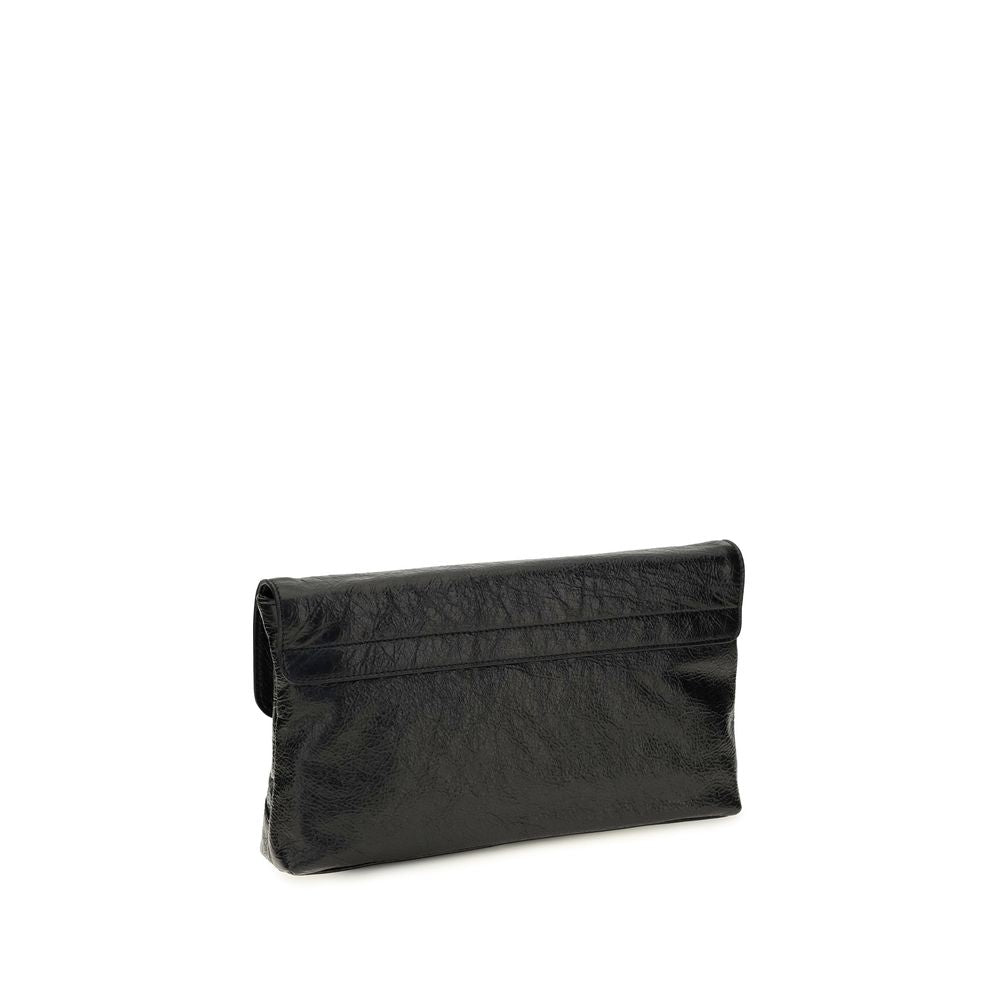 Mini Drawstring Clutch Handbag by Balenciaga for women in calf & lambskin leather bicolour, black & green features an sculptural silhouette, showcasing a secure snap, flap, zipper & magnetic and sculptural with versatile shoulder-strap, adjustable-strap & handle for a sophisticated look.