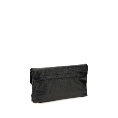 Mini Drawstring Clutch Handbag by Balenciaga for women in calf & lambskin leather bicolour, black & green features an sculptural silhouette, showcasing a secure snap, flap, zipper & magnetic and sculptural with versatile shoulder-strap, adjustable-strap & handle for a sophisticated look.
