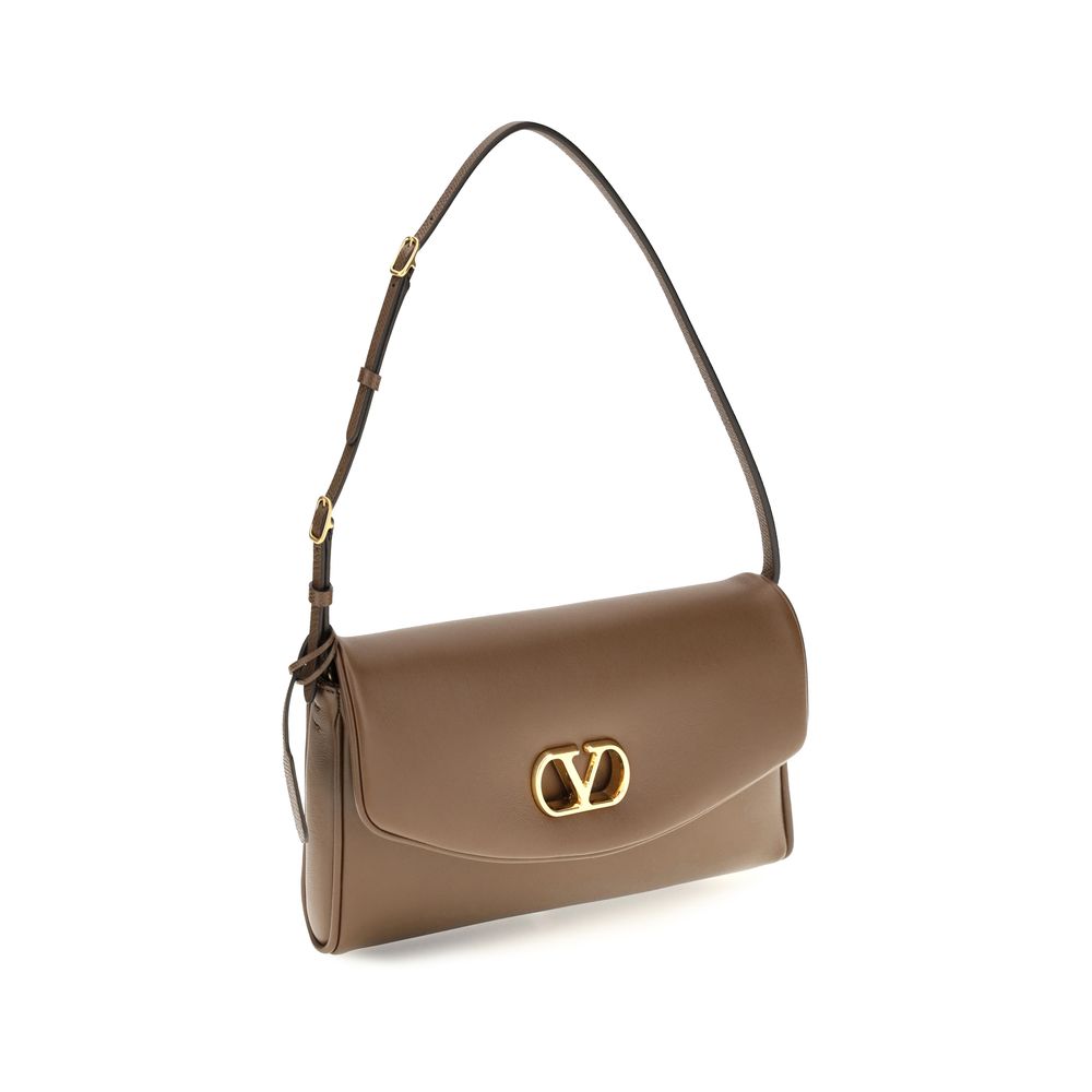Mini Shoulder Flap Bag by Valentino Garavani for women in bos taurus calfskin nappa leather bicolour, brown, green & signature features a effortless chic silhouette with a secure snap, flap & magnetic, ample single-compartment, and versatile shoulder-strap, adjustable-strap & handle for a effortless chic finish.