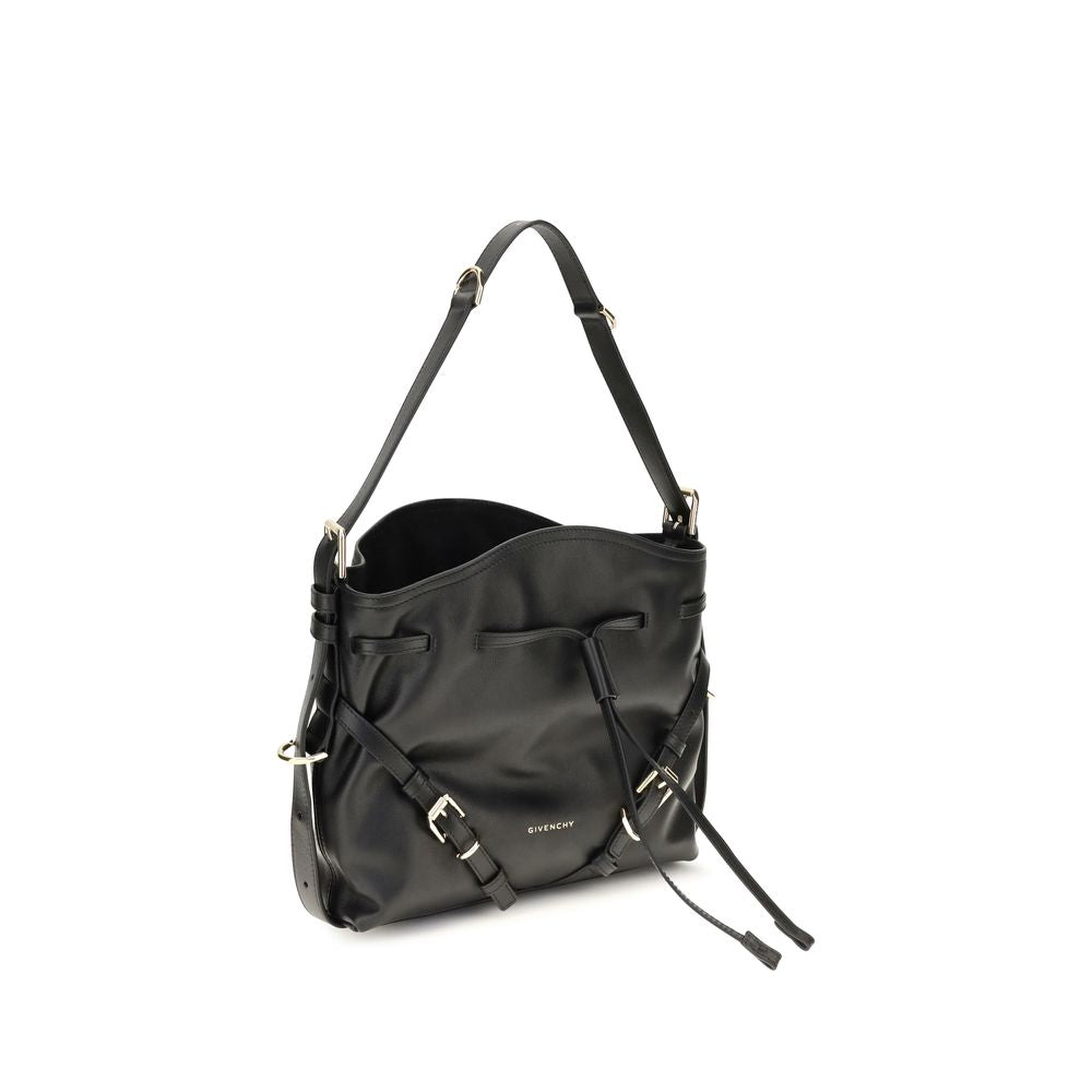 Medium Crossbody Bucket Handbag by Givenchy for women in bos taurus suede calfskin leather bicolour, black, gold, green & signature features a effortlessly chic silhouette, showcasing a secure snap, flap, drawstring & buckle, ample , and versatile crossbody-strap, shoulder-strap, handle, adjustable-strap & detachable-strap for a effortlessly chic look.