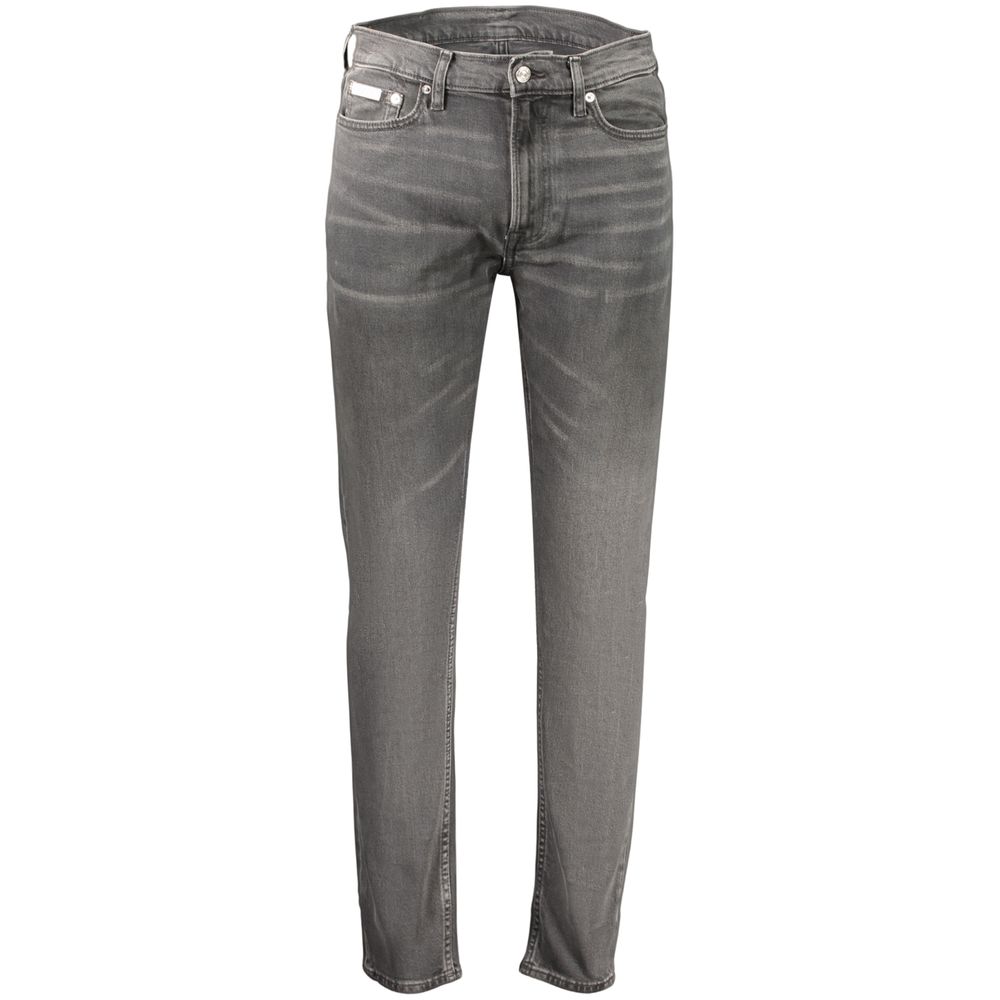 Jeans by Calvin Klein for men in stretch denim cotton black presents a refined pantology silhouette, artfully defined by a refined pantology tapered-leg, long, and a sophisticated .