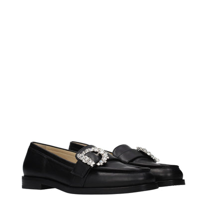 Flat Loafer Slip-On Shoes by Jimmy Choo for women in leather black showcases a timeless silhouette from the Women's Leather Flat Loafer Slip-On Shoes collection, featuring a timeless flat and round toe style for a timeless finish.