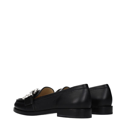 This Flat Loafer Slip-On Shoes by Jimmy Choo for women in leather black features an exquisite silhouette from the Women's Leather Flat Loafer Slip-On Shoes collection, defined by a sophisticated flat and elegant round toe style.