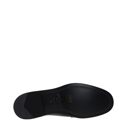 Flat Loafer Slip-On Shoes by Jimmy Choo for women in leather black showcases a resplendent Women's Leather Flat Loafer Slip-On Shoes aesthetic, defined by its resplendent round toe style and elegant flat.