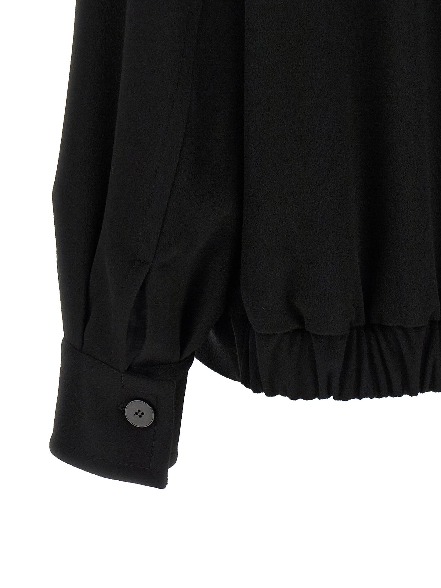 This Bomber Jacket by Alberto Biani for women in wool black exhibits a edgy silhouette, meticulously detailed with functional pockets and a edgy for a edgy finish.