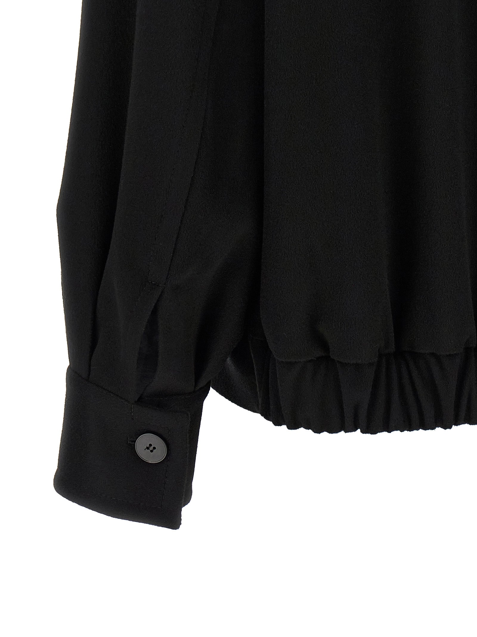This Bomber Jacket by Alberto Biani for women in wool black exhibits a edgy silhouette, meticulously detailed with functional pockets and a edgy for a edgy finish.
