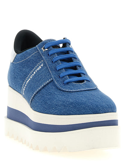 Platform Wedge Sandals by Stella McCartney for women in eva & denim cotton and blue, silver, white & signature presents a captivating silhouette, showcasing the signature style of the Women's EVA & Denim Cotton Platform Wedge Sandals with a captivating platform wedge and captivating .