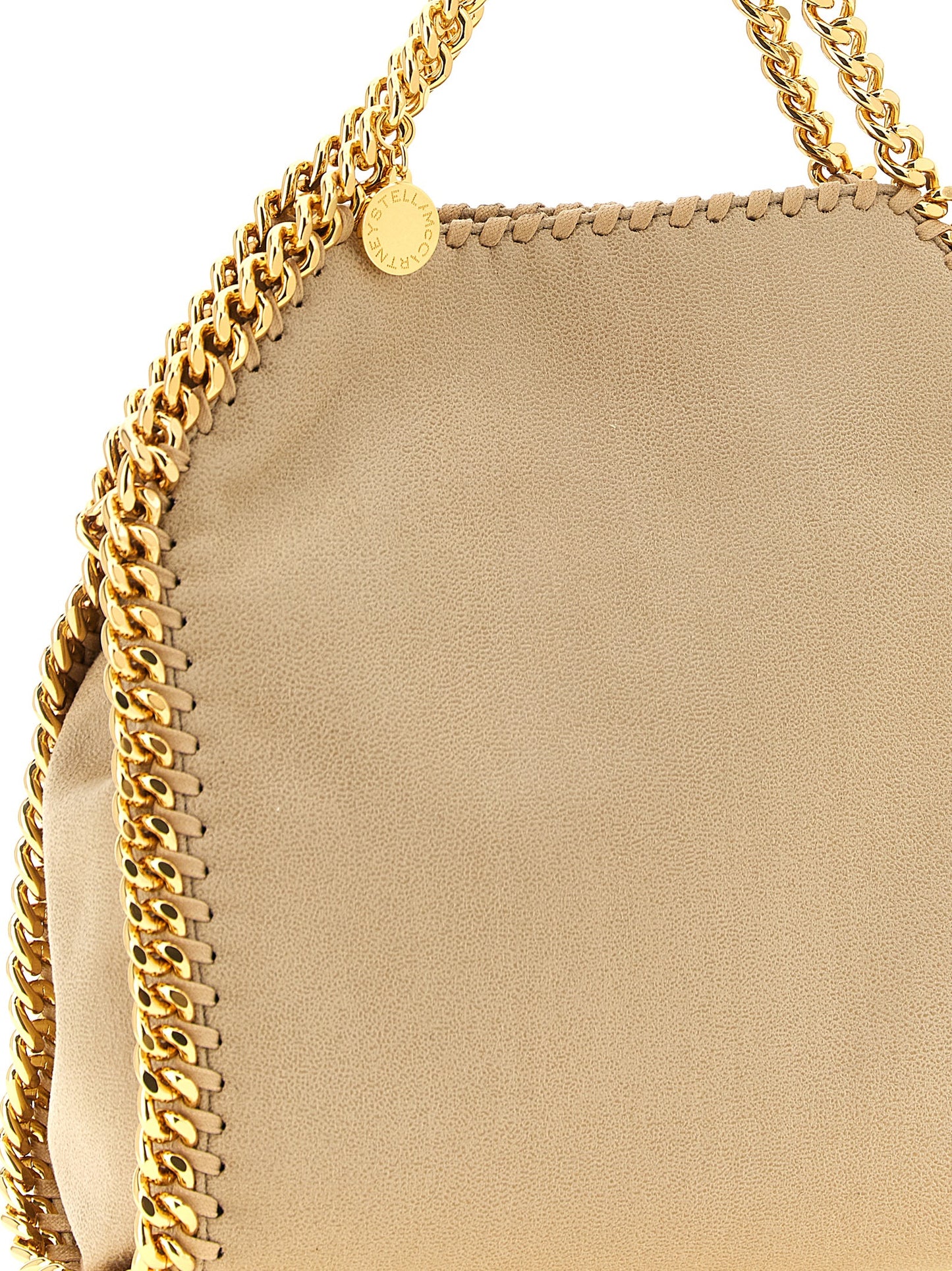 Mini Shoulder Bag by Stella McCartney for women in polyester leather beige & signature features a enviable silhouette, showcasing a secure , ample , and enviable shoulder-strap & handle for a enviable finish.