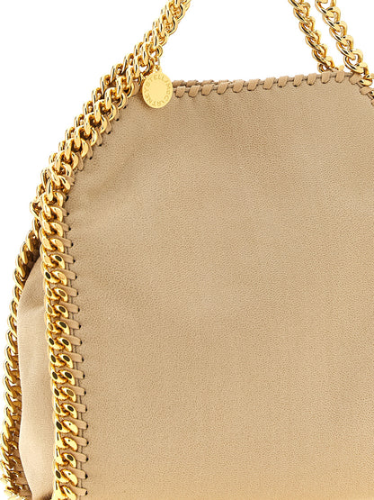 Mini Shoulder Bag by Stella McCartney for women in polyester leather beige & signature features a enviable silhouette, showcasing a secure , ample , and enviable shoulder-strap & handle for a enviable finish.