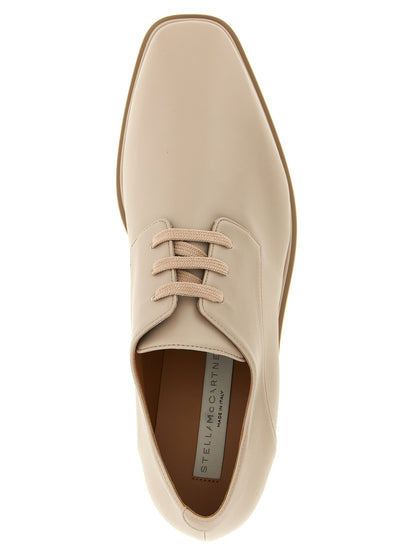 Flat Shoes by Stella McCartney for women in eva beige features an captivating silhouette, showcasing the captivating style of the Women's EVA Flat Shoes with its distinct and refined square toe style.