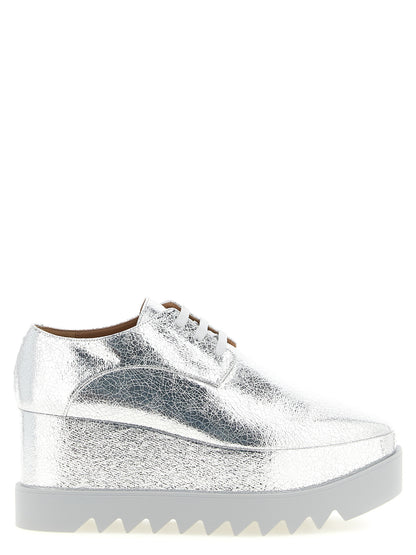 Derby Flat Shoes by Stella McCartney for women in eva silver features an statuesque silhouette from the Women's EVA Derby Flat Shoes collection, showcasing a and a statuesque square toe style for a statuesque look.